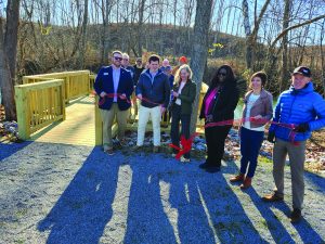The Dan River Basin Association hosted a ribbon-cutting ceremony on Dec. 5 to celebrate the completion of the new adaptive fishing dock project at the Monogram Smith River Sports Complex.