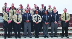 The 41st class poses for a commemorative photo following the ceremony at New College Institute.