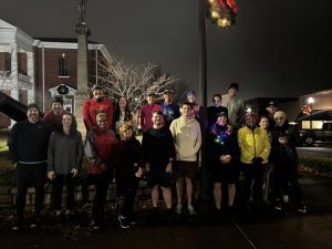 Runners line up for a before-run picture in December. (Contributed)