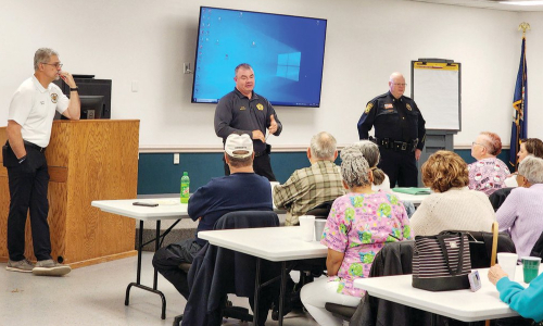 Ben Rea (left, at podium), Henry County Sheriff Wayne Davis (center) and Martinsville Police Chief Rob Fincher.