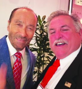 Country singer Lee Greenwood, known for his performance of “God Bless the U.S.A.,”
poses with Ray Reynolds.
