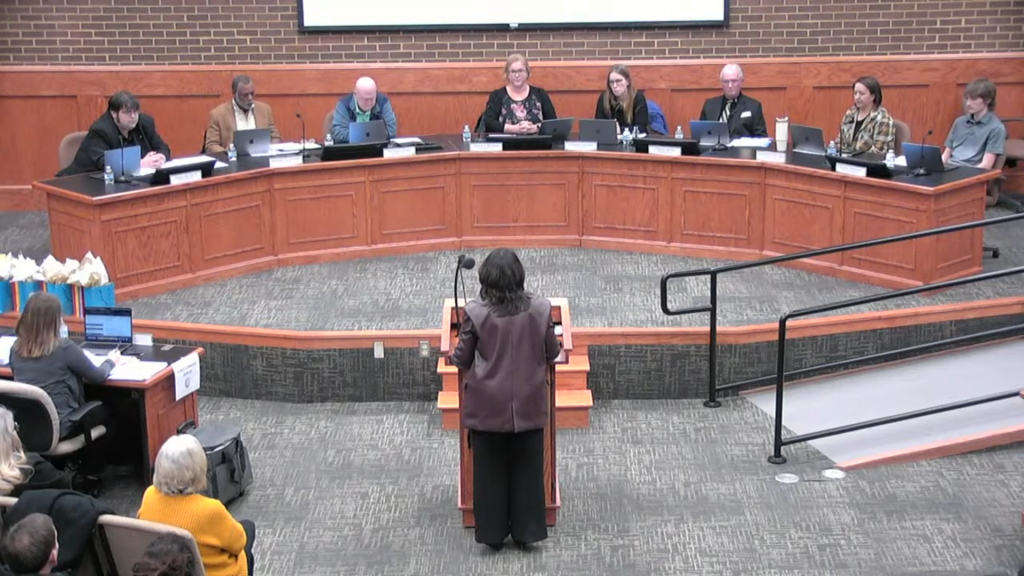 Teddy Martin (far left) and Ben Gravely (second from left) were reelected to serve as chairman and vice chairman of the board.