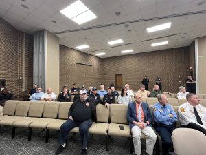 Volunteer firefighters attended the meeting to support Collinsville’s fire truck request.