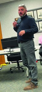 Greg Maggard gives information on the installation of the fitness pad at Baldwin Park.