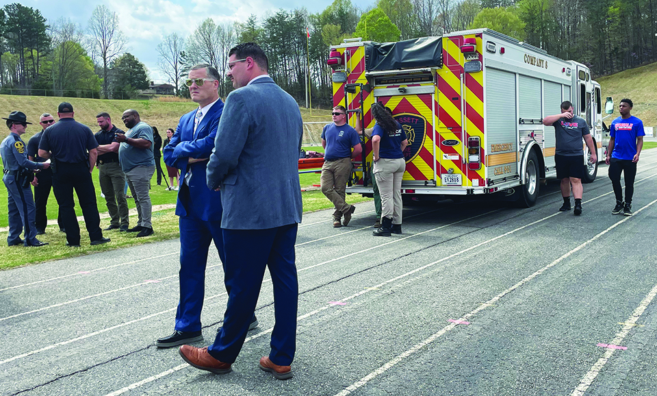 A mock car accident scene was set up at Bassett High School before prom to raise awareness about the dangers of distracted driving.