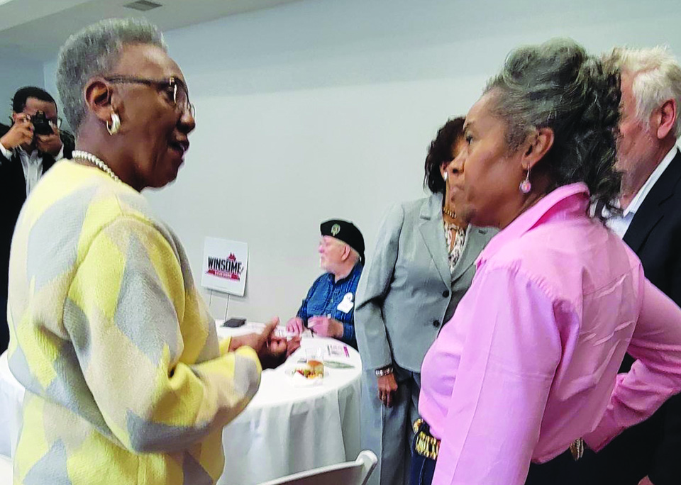 Naomi Hodge-Muse talks to Lt. Governor Winsome Earle-Sears on Saturday.