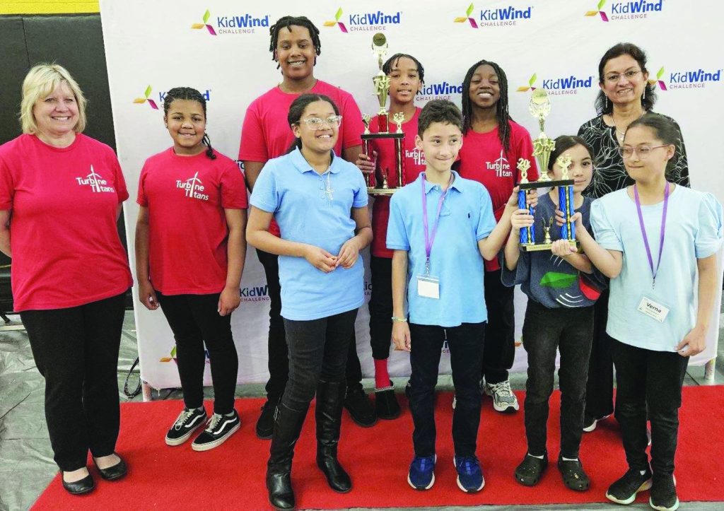 Wind Speeders/Elementary Team (Row 1) - Alivia Williams, Vernon Midkiff, Aria Vasquez, and Verna Midkiff; Turbine Titans/Middle School Team (Row 2) - Coach Dr. Wendy Grimshaw, Keegan Redd, NyShawn Walton, Remington Crockett, Jamison Jackson, & Dr. Susheela Shanta. (Contributed)
