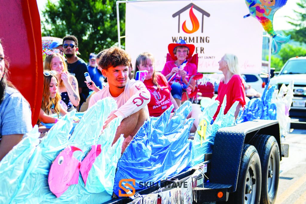 The Warming Center drew strong support during the parade, with volunteers and advocates riding together on a community float. (Photos courtesy of Skill Wave Media.)
