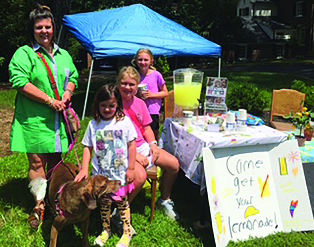 Lucy Rothrock and her friends Liza Harris and Sally Vaughn are dedicated to helping animals, and hold events to support the SPCA.