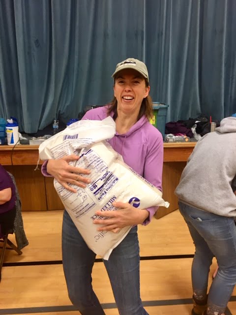 Local church group packages 30,000 meals for the hungry