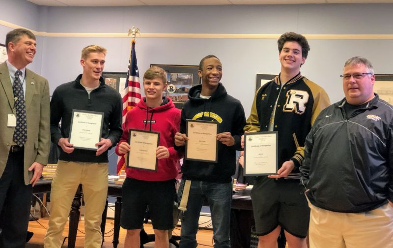 School board honors all-state football players