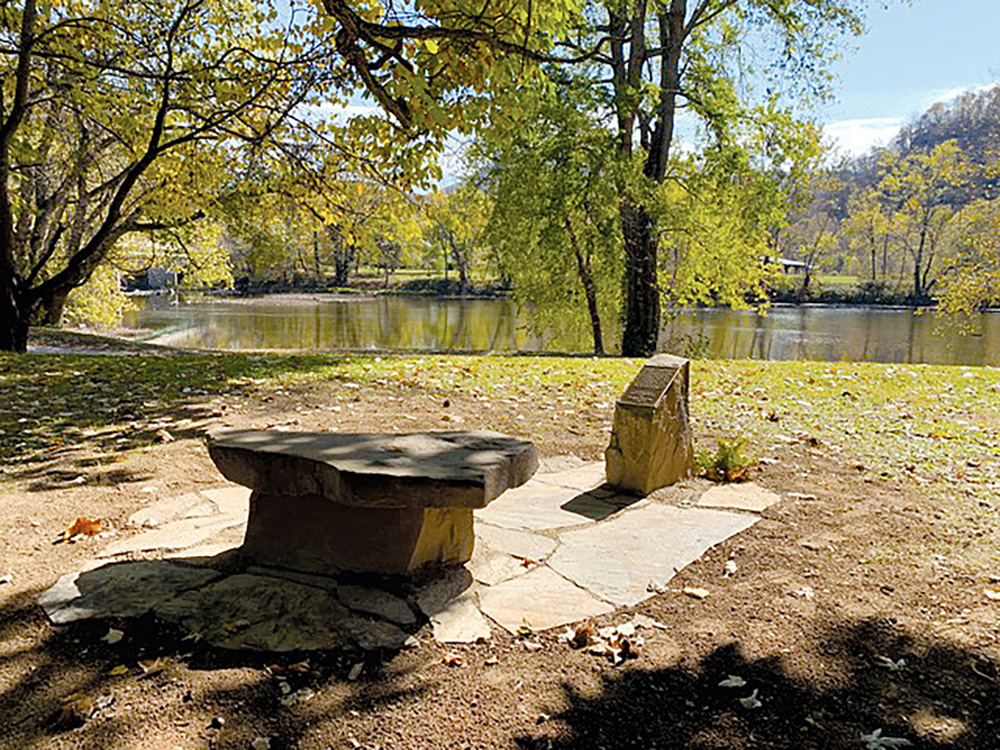 Stone memorial for Leslie McCarty installed at Caldwell Boat Launch