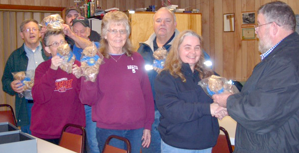 Eagle Rock Ruritans present 8 Rudy Bears to Fire and Rescue