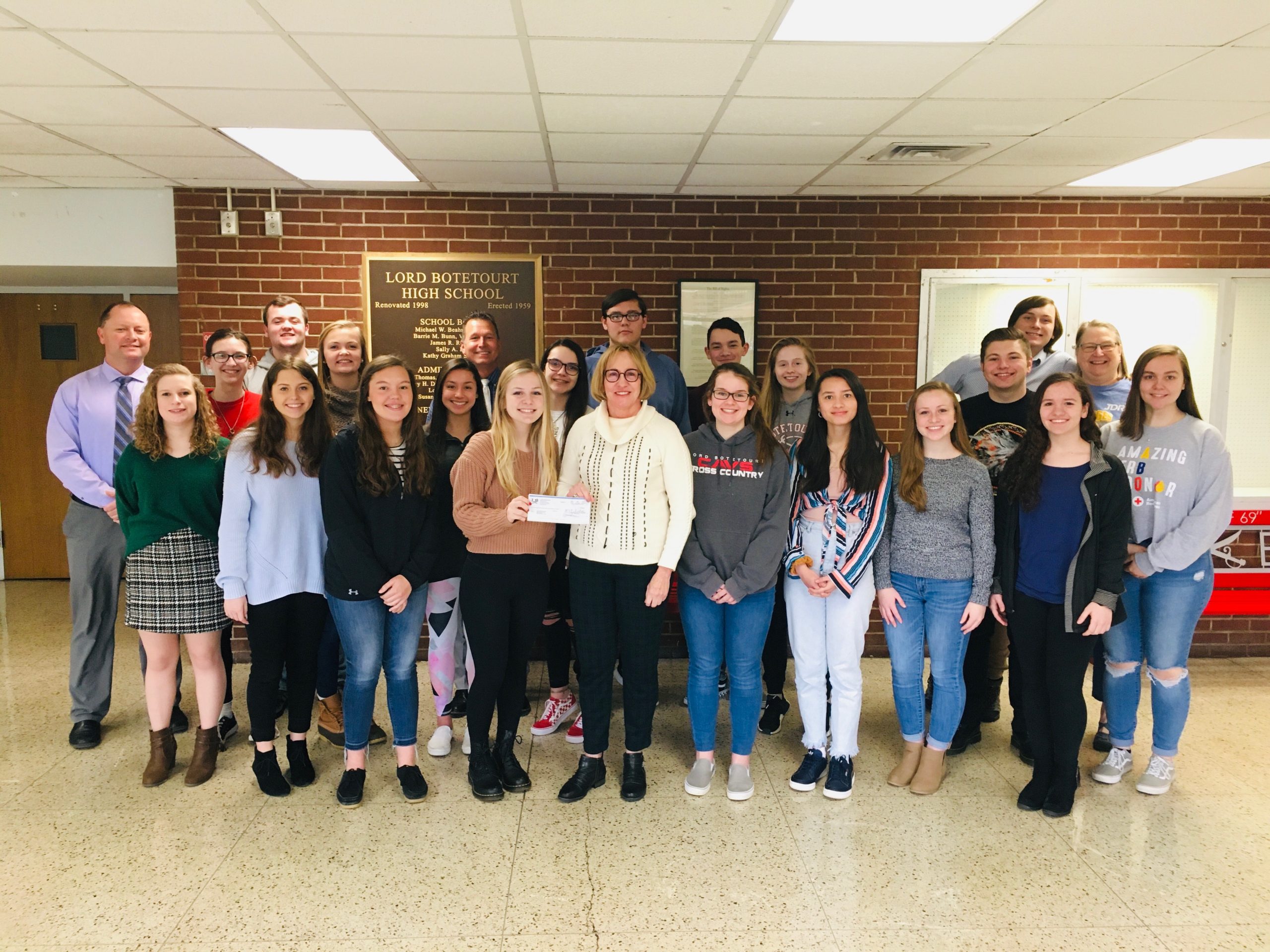 LB Leader Academy presents check JDRF