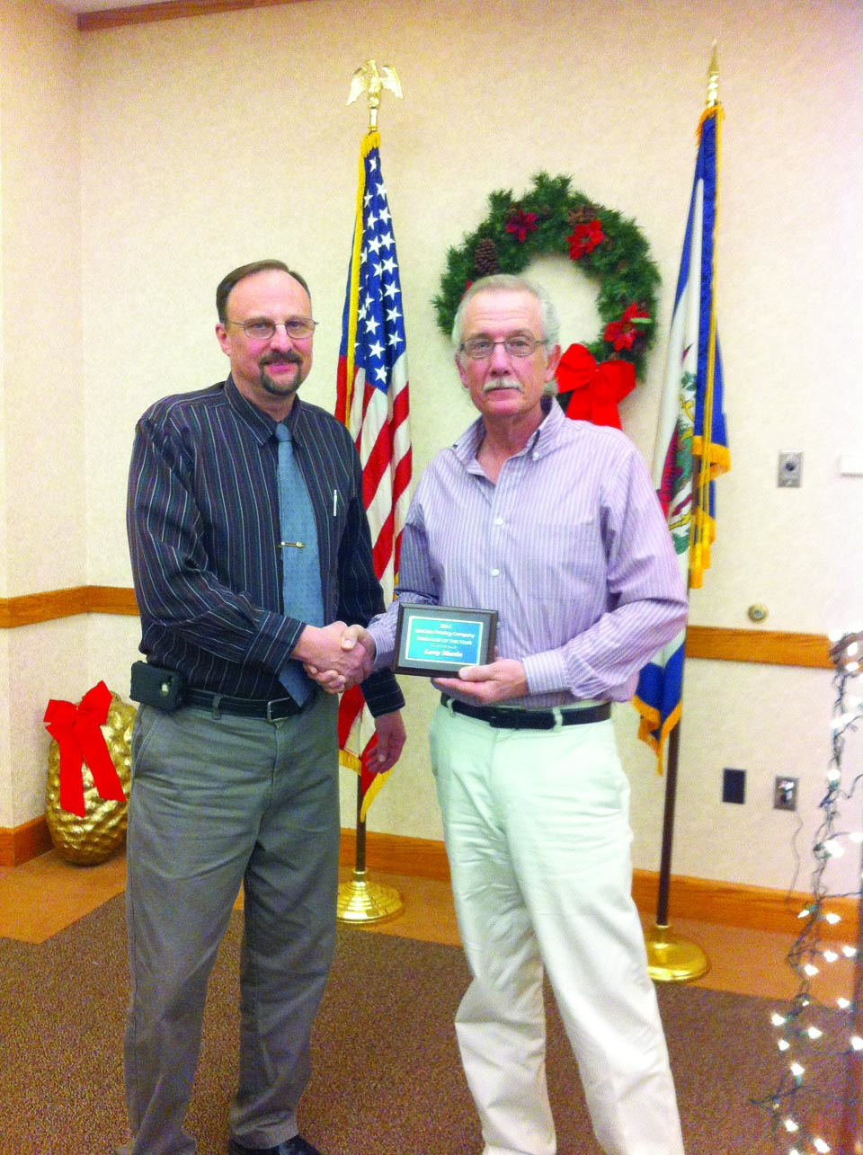 Ken Smith and Larry Martin, McClain Printing Company’s 2015 Employee of the Year.