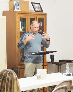 Doug Perry (at podium) and Walter Scott hosted a community meeting Friday. Perry is the vice-chairman of the Patrick County Board of Supervisors. Scott is his counterpart on the Patrick County School Board. 