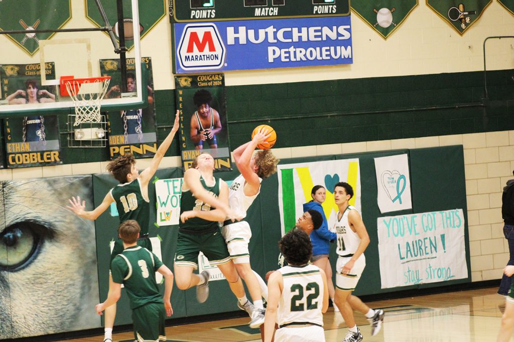 Noah Jessup drives over Glenvar defenders for the shot.