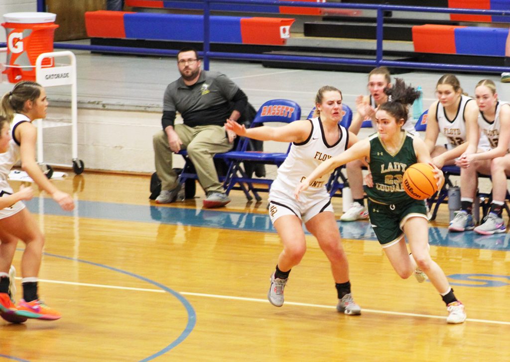 Eliza Clifton drives past a Floyd defender.