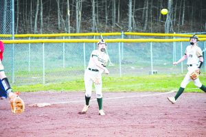 Lauren Hazelwood makes a throw from 3rd to 1st. 