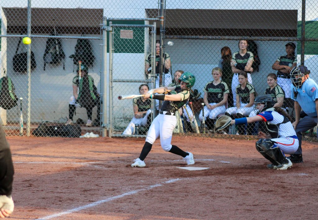 Journey Moore sends the ball over the fence for a 2-run home run.