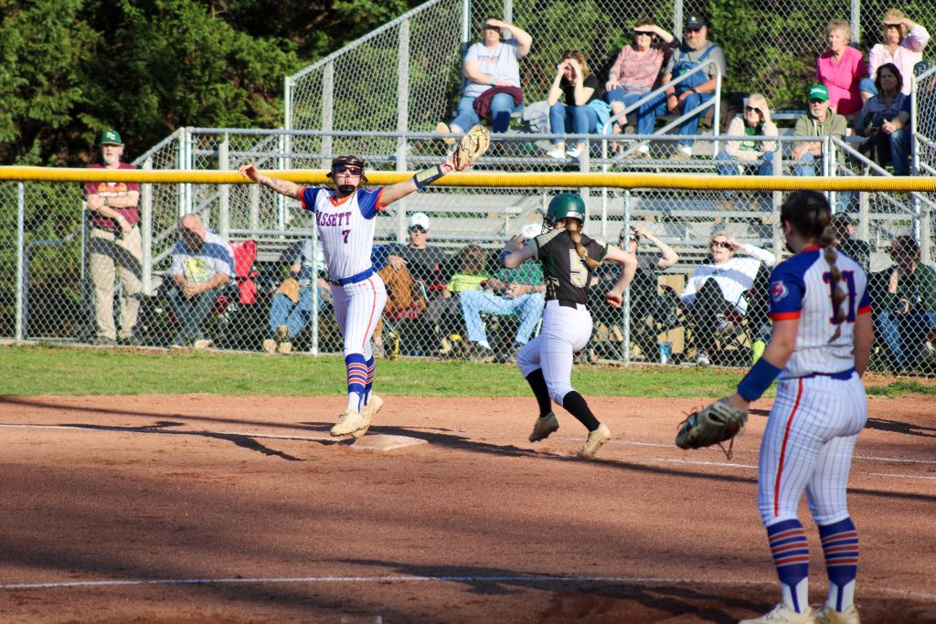 Lauren Hazelwood races to beat the throw at first.