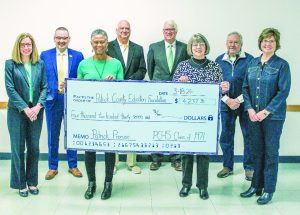 P&HCC officials accept a donation from members of the PCHS Class of 1971. Row 1 (from L to R): P&HCC Foundation executive director Tiffani Underwood, Sandra Hylton, Rhonda Nelson, Patrick County site facilitator Angie Brown. Row 2 (from L to R): P&HCC president Dr. Greg Hodges, Ron Haley, Dr. Stewart Roberson, Ralph Nelson.