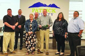 The Patrick County School Board recognized Deputy Cameron Adkins for his assistance in getting digital radios and GPS for school buses.