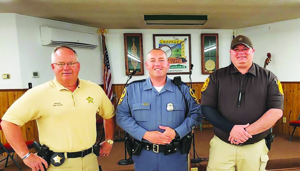 Pictured, left to right, are Patrick County Sheriff Dan Smith, Virginia State Trooper Robert Lawson, and Patrick County deputy Eric Sain. (Photo by Mary Dellenback Hill.)