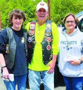 Rita and Darrell Bowling (from left to right), present P&HCC Foundation executive assistant Letitia Pulliam with a donation from the ride in 2023.