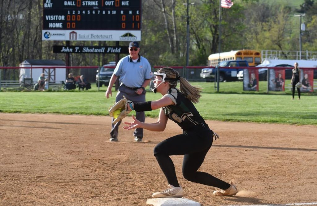 Lilly Hazelwood catches the ball for an out at second base.