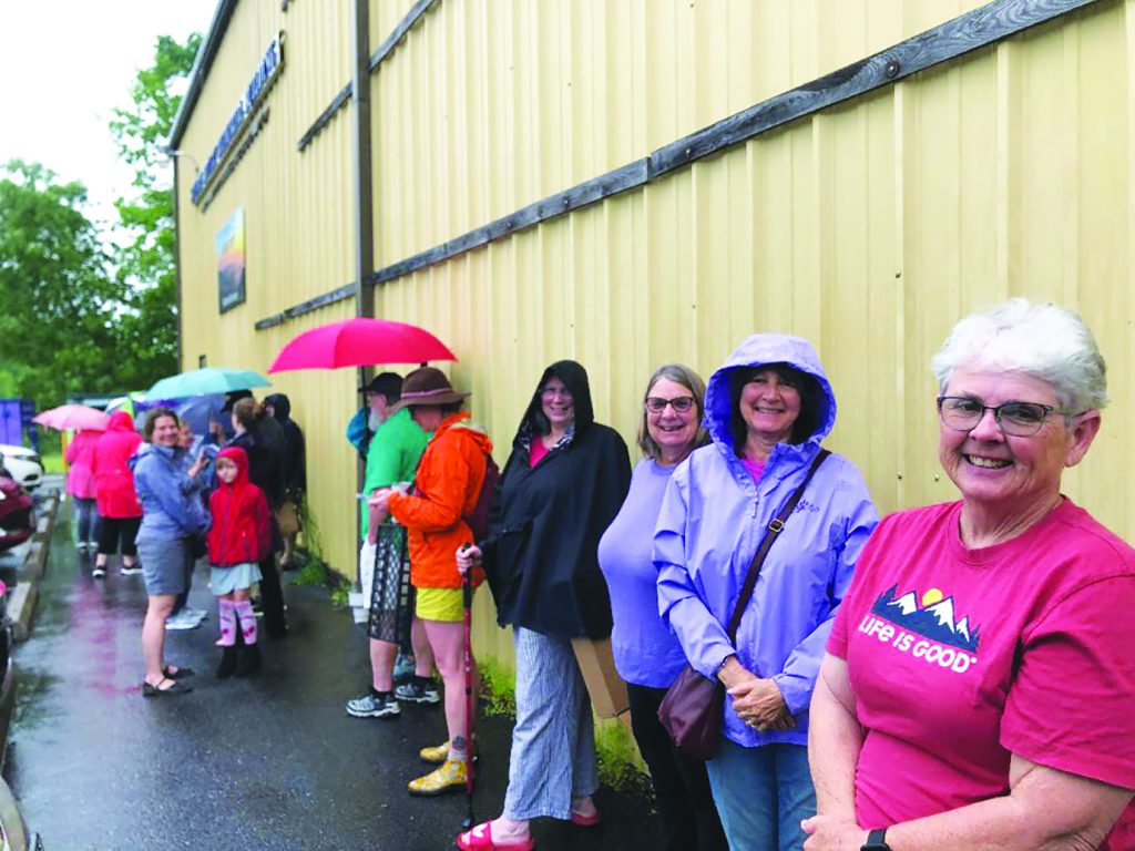 Despite heavy rains Saturday morning, the line at the Stuart Rotary Building was long as people waited for the 8 a.m. opening of the Patrick County Master Gardeners annual plant sale.