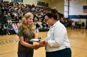 Daryl Lynn Combs receives the William and Mary Leadership Award from Ms. Hope Perry, PCHS Principal.