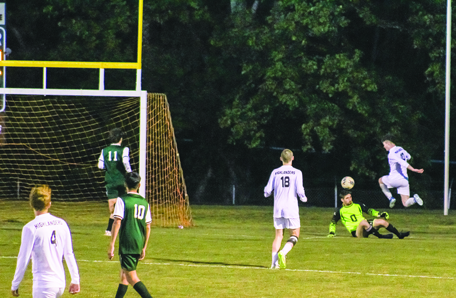 Cougar goaltender Jonah Byers breaks up a Glenvar scoring chance.