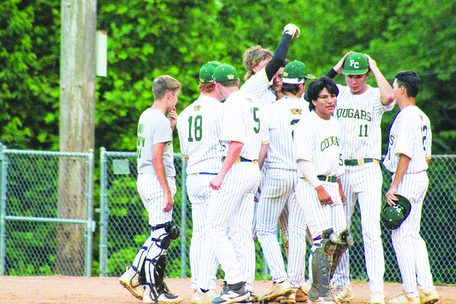 Cougar players console each other following the game