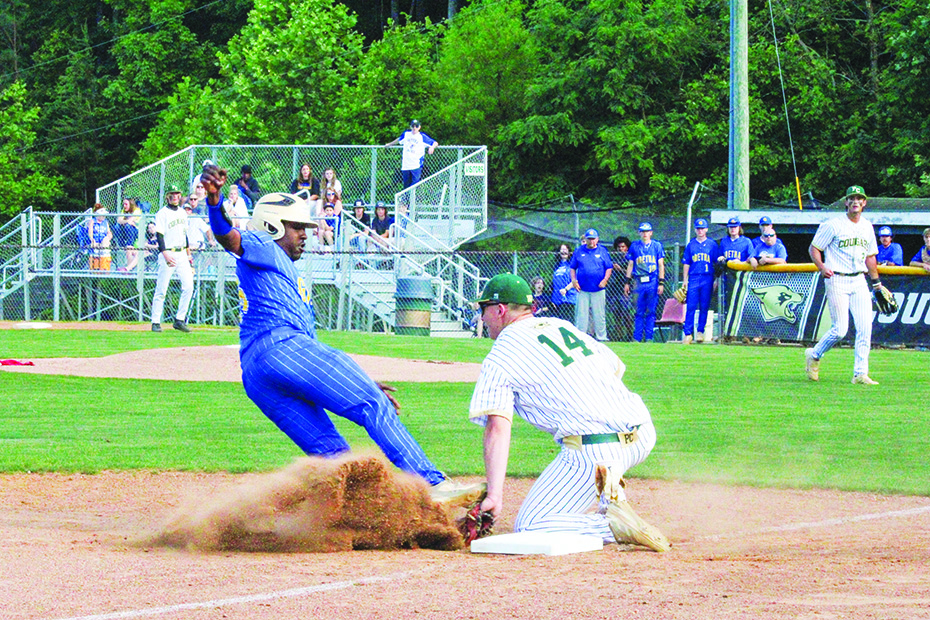 Gretna player slides in high on Cougar third baseman Jackson Horton