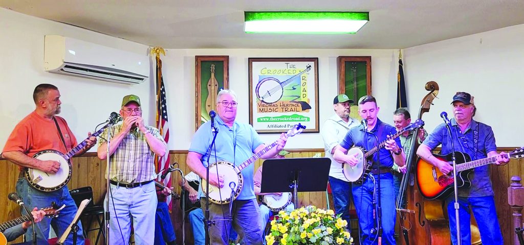 Pictured left to right is Rick Sebastian, banjo; Ralph Keen, harmonica; Tommy Morse, banjo; Tyler Hughes, banjo; Alan Cray, guitar. Seated in back is Don Rierson, fiddle; Wade McMillian, guitar; Dwight Lawson, banjo with Shane Vestal, mandolin and Jamie Graham, bass.