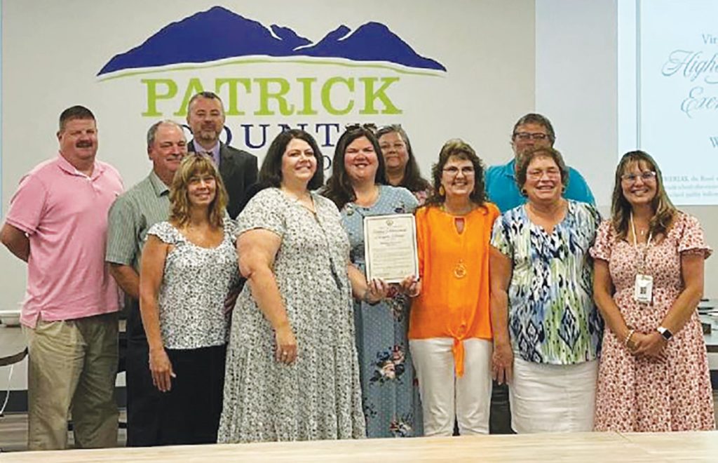 The Patrick County School Board approved a resolution honoring Woolwine Elementary School staff for receiving the Highest Achievement Exemplar Award.