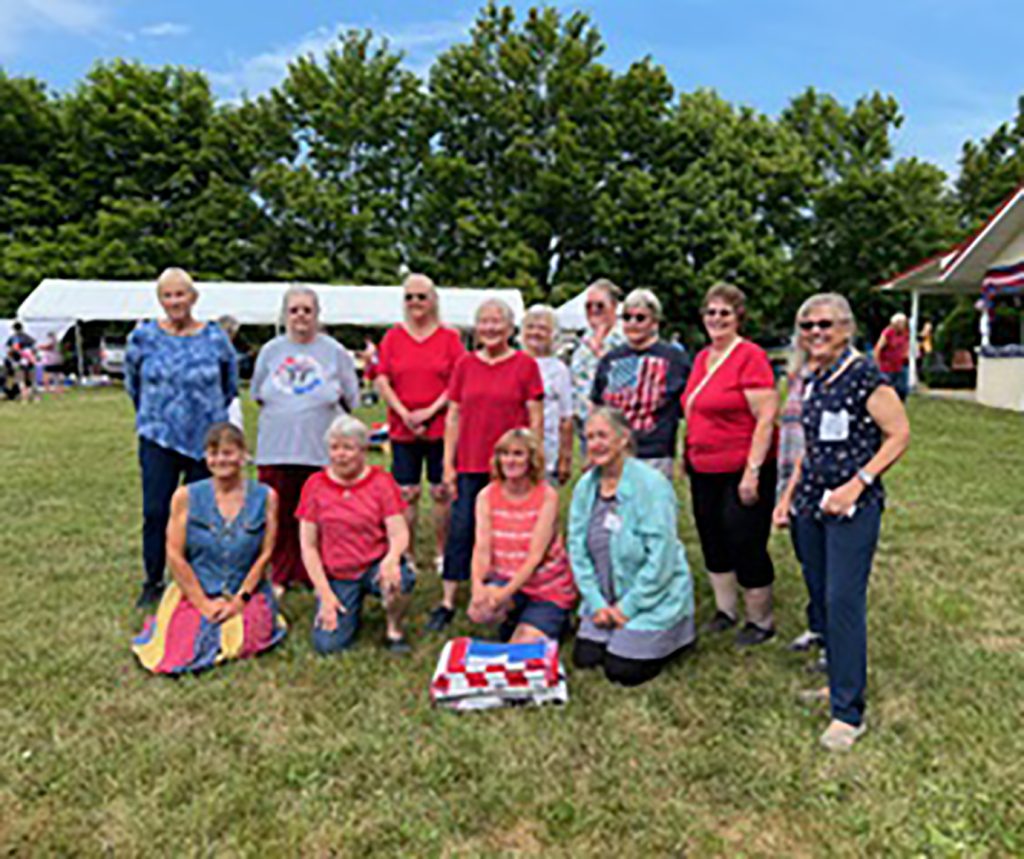 The quilts were all made by Freedom Quilty Ladies pictured.