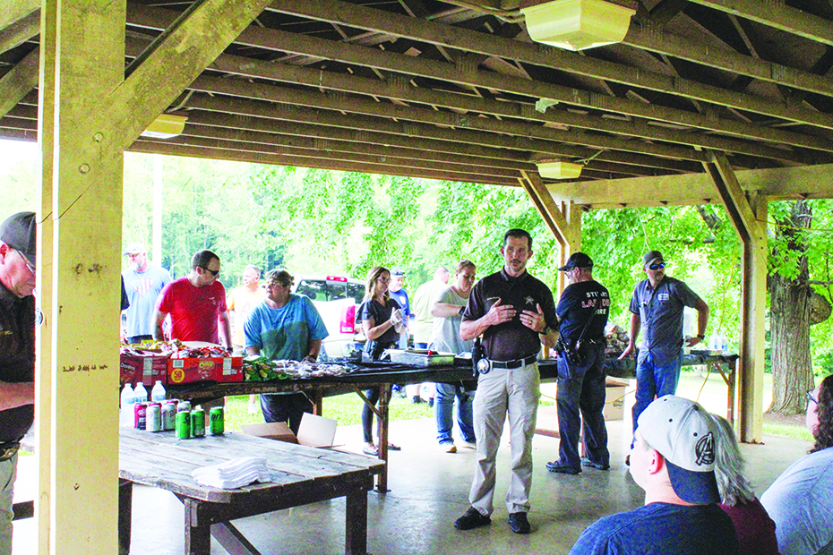 Patrick County Sheriff’s Capt. Eric O’Connell welcomed those who participated, as other officers and first responders worked to prepare food and help serve hotdogs and the fixings.