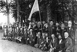 July 4th, 1900, Confederate Veterans Reunion in Ballard, VA. Peter Craig holding the flag. (Photo from Patrick County Historical Society.)