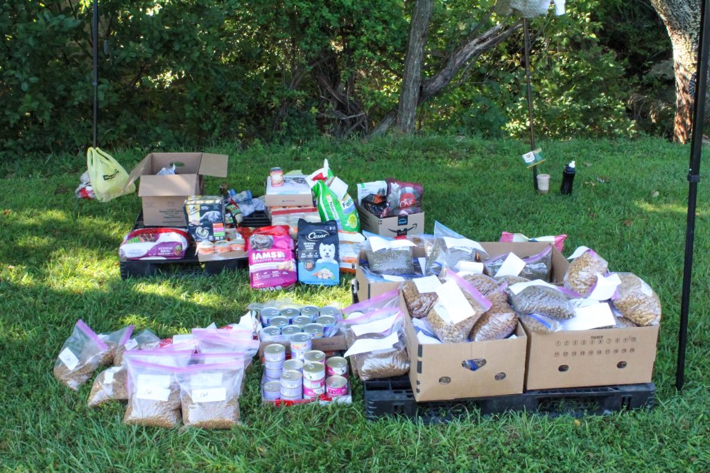 Both bags and cans of cat and dog food were distributed on August 12.