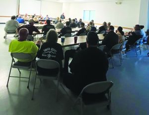 More than two dozen residents, many of them volunteers with fire and EMS squads, attended the town hall meeting.