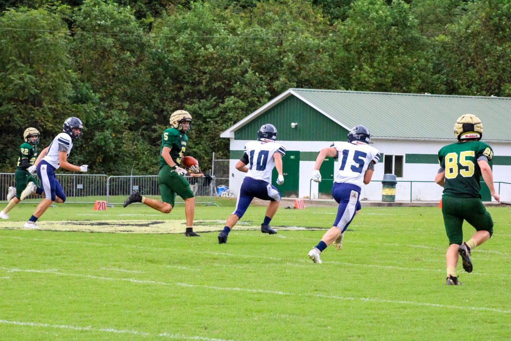 Jackson Callahan sprints downfield following a pass reception