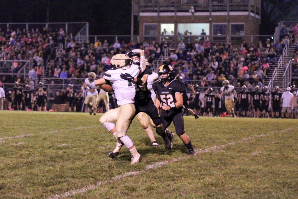 Noah Jessup fights for yards on a kickoff return.