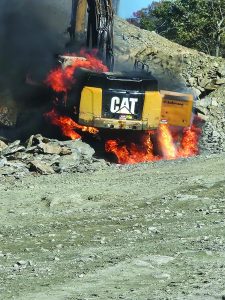 A track hoe, a type of excavation equipment, caught fire on Monday, October 28.