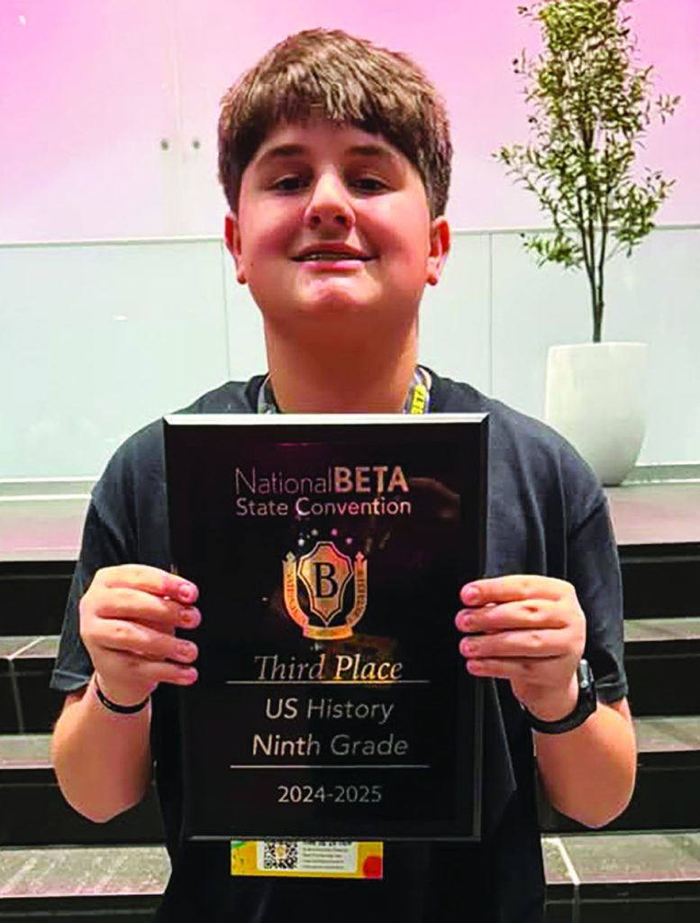Aiden Slate with his award.
