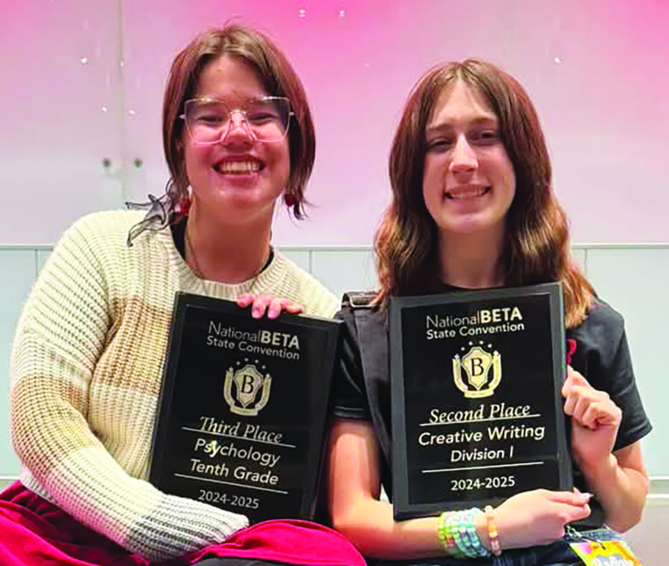 Isobel Clay (left) and Willow Hylton (right) with their awards.