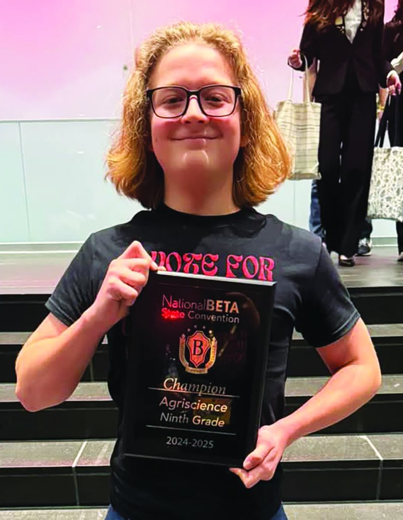 Thomas Eckman with his award.