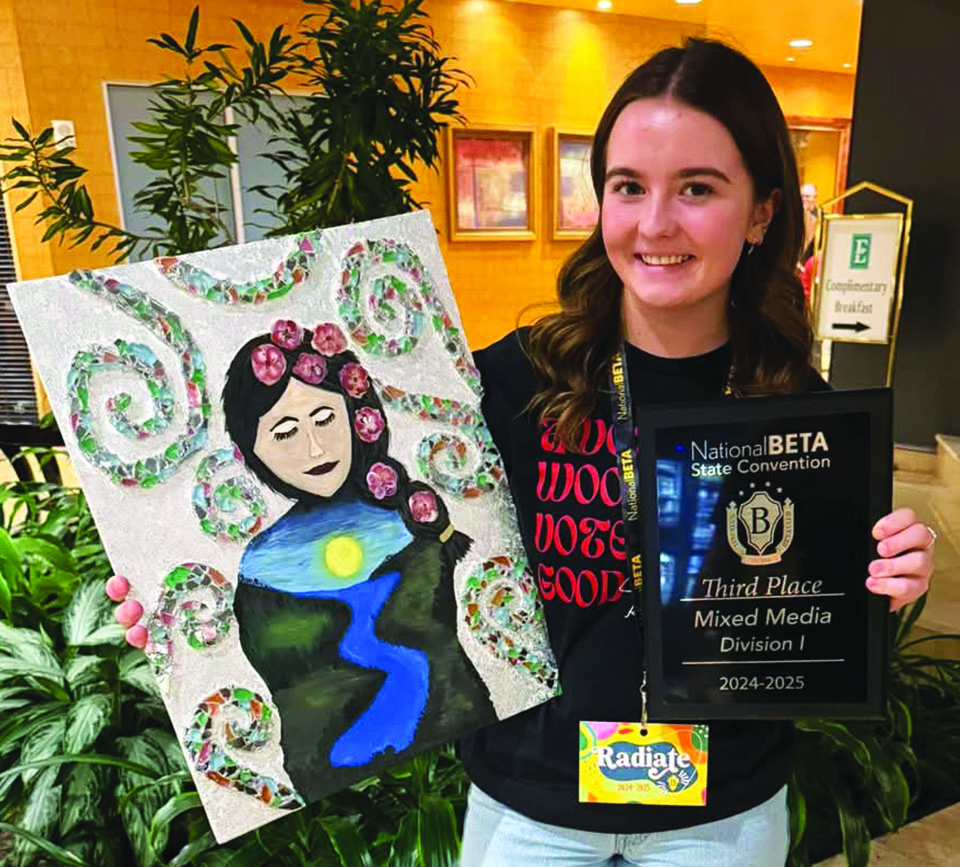 Lacey Sutphin with her awards.