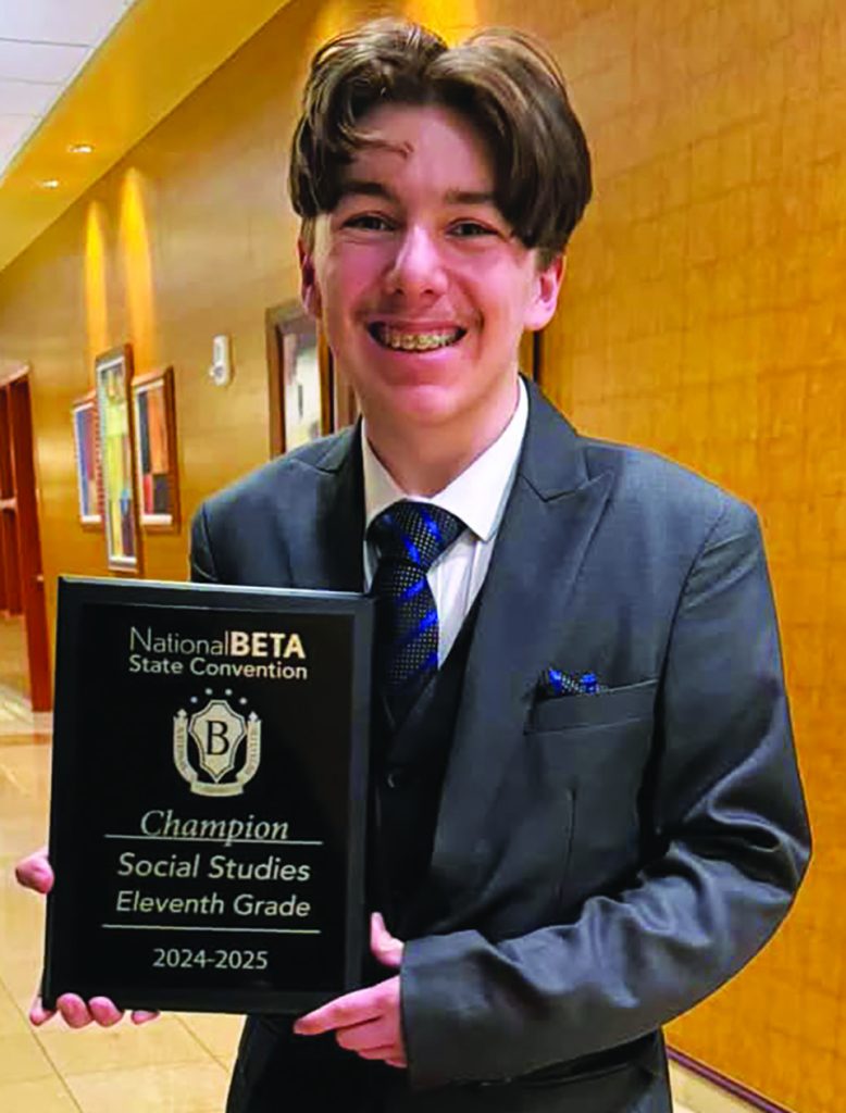 Draysin Maselli with his award.
